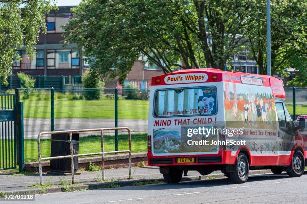 mobile ice cream van outside a school - johnfscott stock pictures, royalty-free photos & images