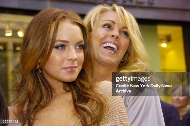 Lindsay Lohan arrives at the DGA Theater with mother Dina for the New York premiere of the movie "A Prairie Home Companion." She stars in the film.