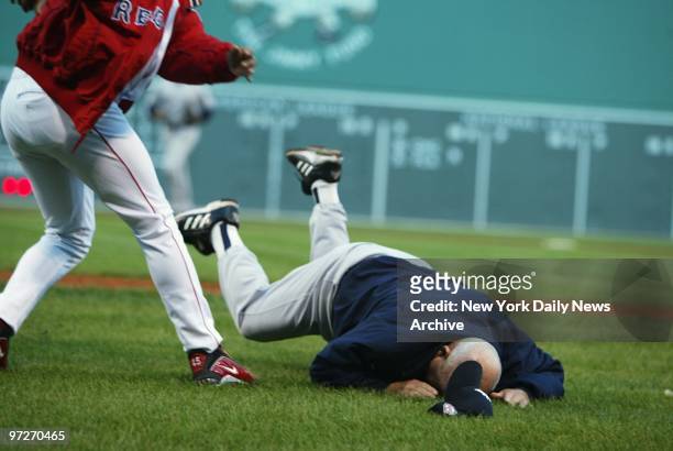 Boston Red Sox' pitcher Pedro Martinez throws 72-year-old New York Yankees' bench coach Don Zimmer to the ground in a fourth-inning fracas at Fenway...
