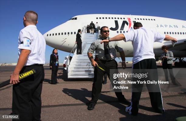 New York Mets' third baseman David Wright goes through security as he and other Major League baseball stars board a flight to Tokyo for the 2006...