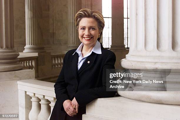 Sen.Hillary Rodham Clinton smiles for her official portrait in the rotunda of the Russell Senate Office Building.