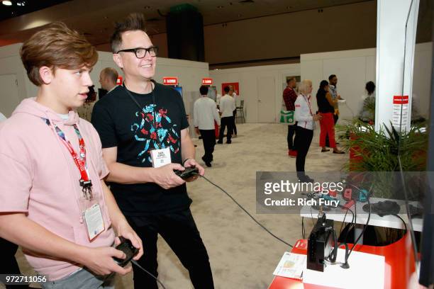 Mark Hoppus and Jack Hoppus visit the Nintendo booth during the 2018 E3 Gaming Convention at Los Angeles Convention Center on June 12, 2018 in Los...