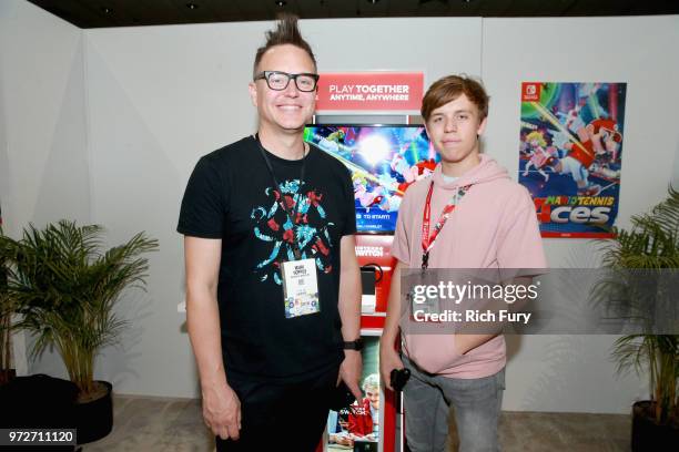 Mark Hoppus and Jack Hoppus visit the Nintendo booth during the 2018 E3 Gaming Convention at Los Angeles Convention Center on June 12, 2018 in Los...