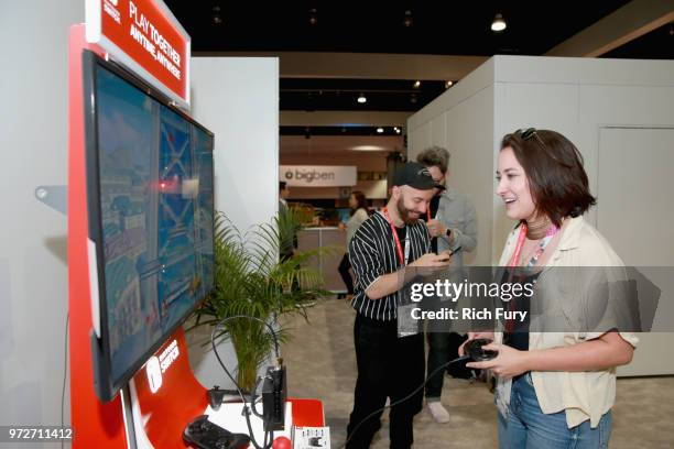 Zelda Williams gets a look at the Super Smash Bros. Game on the Nintendo Switch system during the 2018 E3 Gaming Convention at Los Angeles Convention...