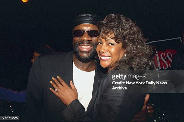 Isaac Hayes gets a birthday hug from Mary Wilson at his 55th birthday party at the Supper Club, where he also launched the World Literacy Crusade.