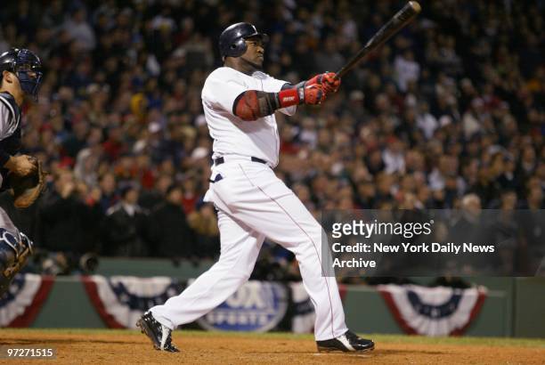 Boston Red Sox's David Ortiz hits a two-run, walk-off homer in the 12th inning to stave off elimination, winning Game 4 of the American League...