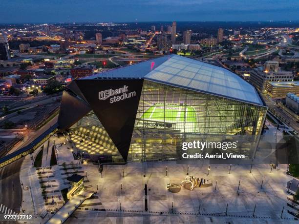 aerial of us bank stadium at dusk - minneapolis stadium stock pictures, royalty-free photos & images