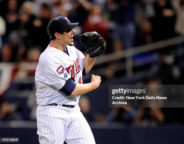 New York Yankees against the Minnesota Twins in Game 3 of the American League Division Series. Carl Pavano celebrates after striking out Johnny Damon...
