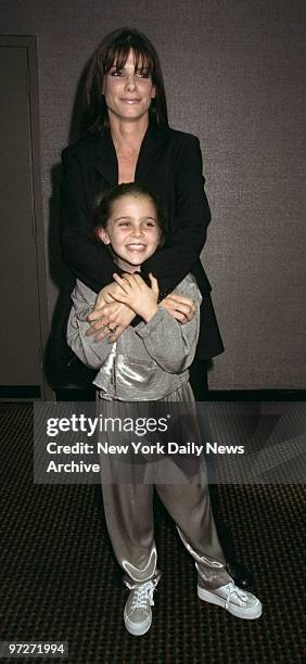 Sandra Bullock and Mae Whitman, who plays Sandra's daughter, attending screening of movie "Hope Floats" at Cinema 2.