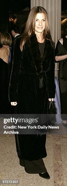 Sandra Bullock attending Metropolitan Museum of Art Costume Institute gala to introduce Gianni Versace Exhibition.