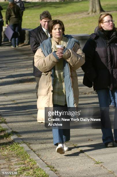 Sandra Bullock has a warm drink during a break in the filming of her new movie, "Every Word is True," in Fort Greene Park. She plays author Harper...