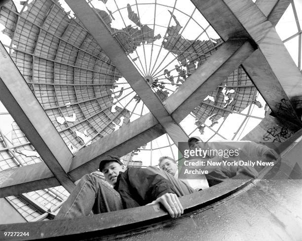 It looks like a ride at an amusement park, but it's just three guys hanging out inside the Unisphere, built for the 1964-65 World's Fair, during...