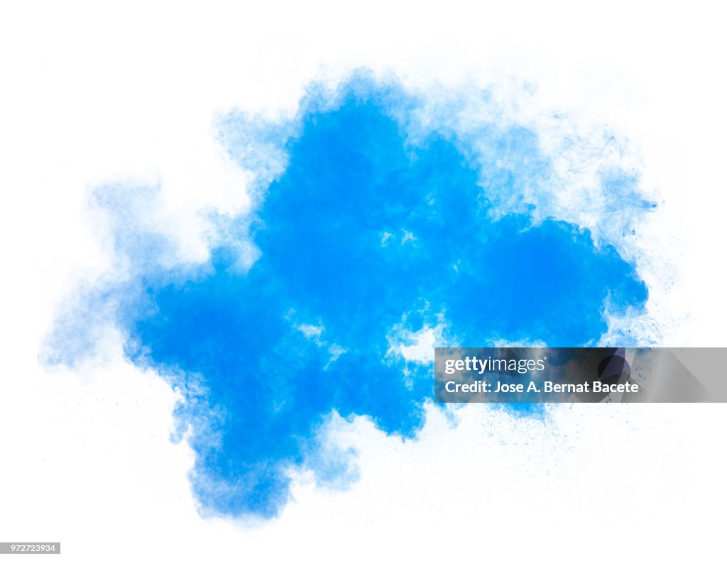 Full frame of forms and textures of an explosion of powder and smoke of color light blue and dark blue on a white background.