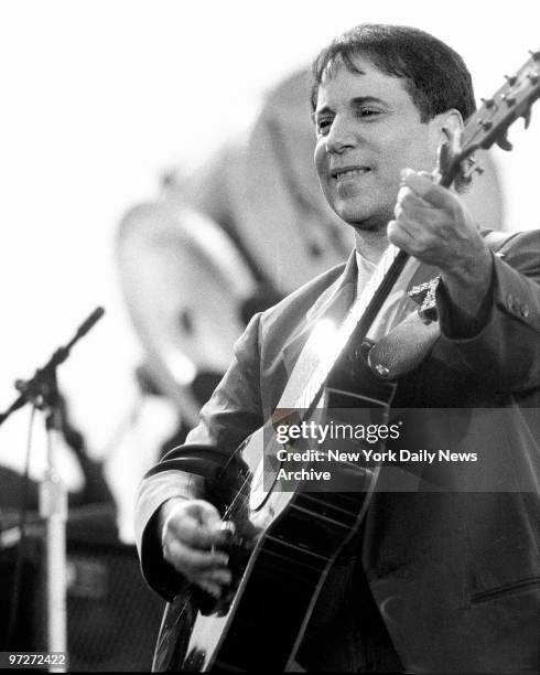 It was a day of miracles and wonder as fans jammed Central Park's Great Lawn to hear Paul Simon perform a free concert.
