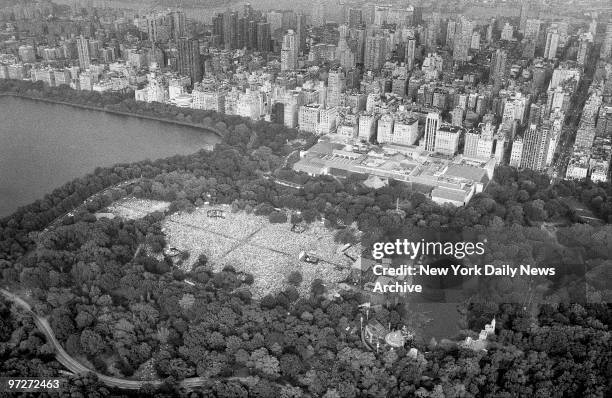 It was a day of miracles and wonder as fans jammed Central Park's Great Lawn to hear Paul Simon perform a free concert.