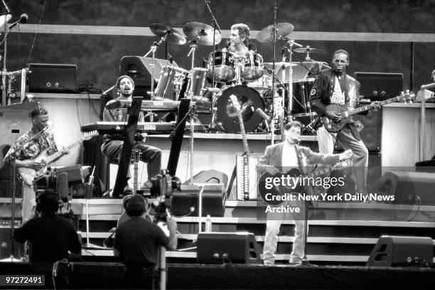 It was a day of miracles and wonder as fans jammed Central Park's Great Lawn to hear Paul Simon perform a free concert.