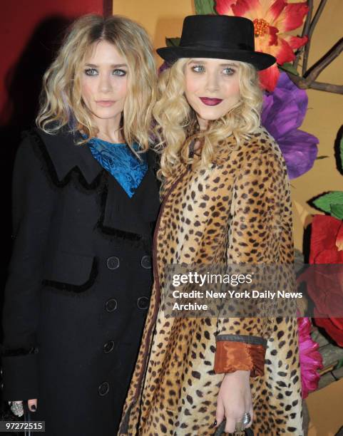 It was easy to tell the Olsen twins apart at a MoMA benefit: Mary-Kate went for demure, while Ashley rocked a leopard print!