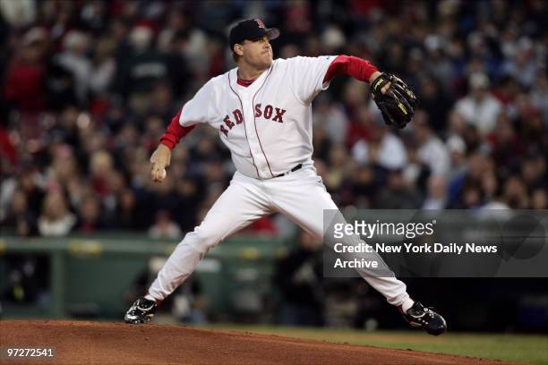 Boston Red Sox's starter Curt Schilling delivers a pitch against the New York Yankees during a game at Fenway Park. Schilling was tagged for five...