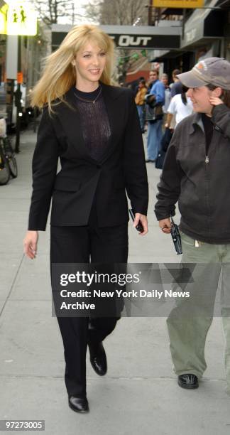 Lisa Kudrow stolls along Amsterdam Ave.outside Riverside Memorial Chapel where she was filming the movie "Analyze That."