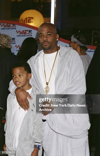 Music producer Damon Dash and his son arrive for the MTV Video Music Awards at the Metropolitan Opera House in Lincoln Center. Late singer Aaliyah,...