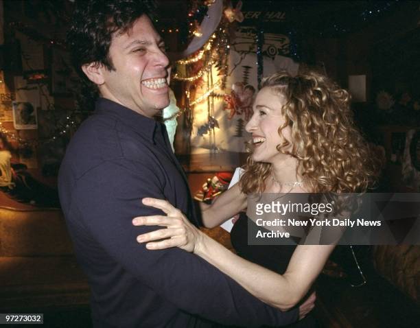 Sarah Jessica Parker shares a laugh with show's Darren Star at Webster Hall where HBO was filming its new comedy series "Sex and the City." The show,...