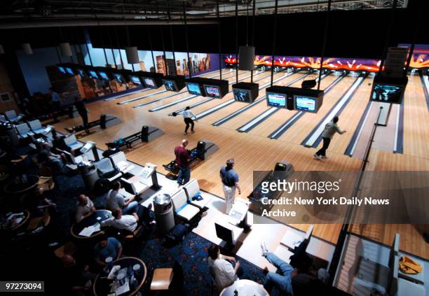 Bowlers compete during the last night of the Tuesday Night Teams bowling league season at Chelsea Piers.,