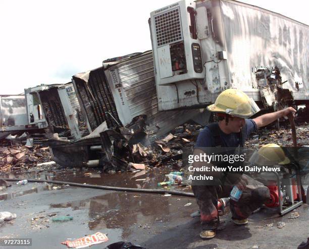 The cleanup begins on morning after the rioting at Woodstock '99 in Rome, N.Y.