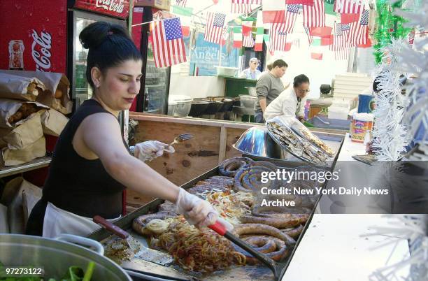 Sausages are ready for hungry strollers at the 75th annual Feast of San Gennaro. The 11-day celebration in Little Italy features food, drink, games...