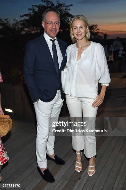 Andrew Saffir and Kelly Rutherford attend the International Medical Corps summer cocktail event hosted by Sienna Miller and Milk Studios at Milk...