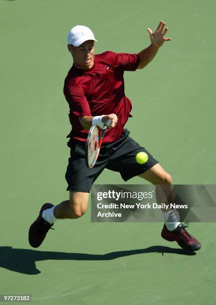 Lleyton Hewitt of Australia smacks a return to Hyung-Taik Lee of South Korea at the U.S. Open in Louis Armstrong Stadium at Flushing Meadows-Corona...