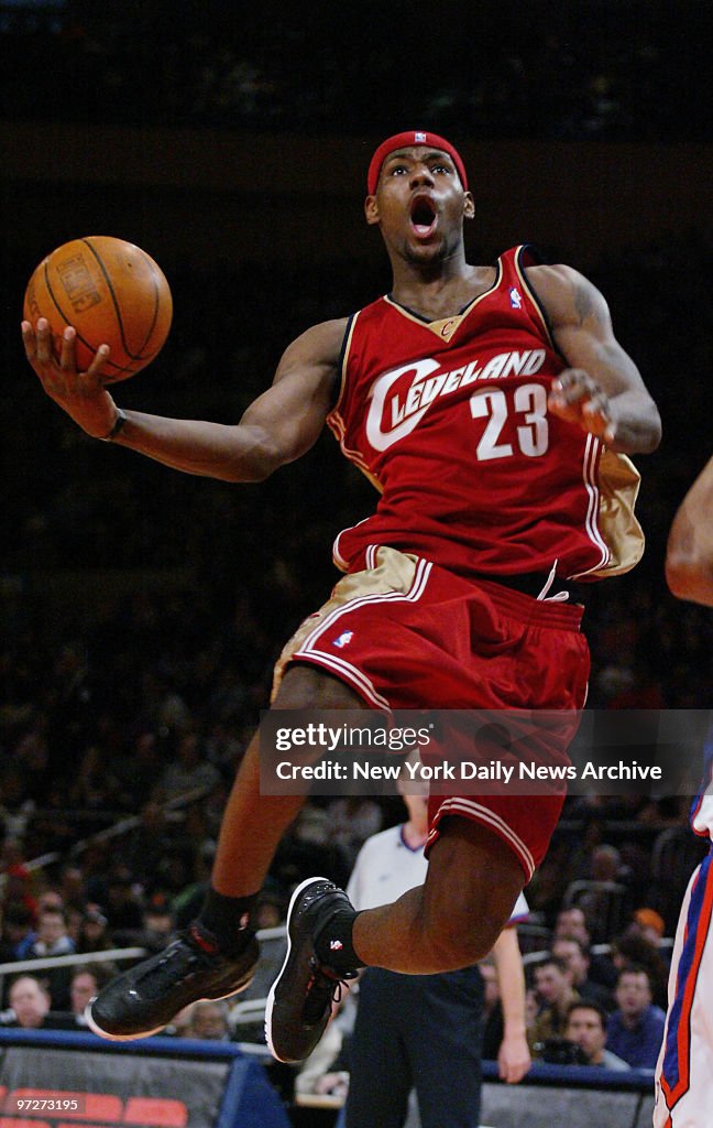 The Cleveland Cavaliers' LeBron James goes airborne for a sh