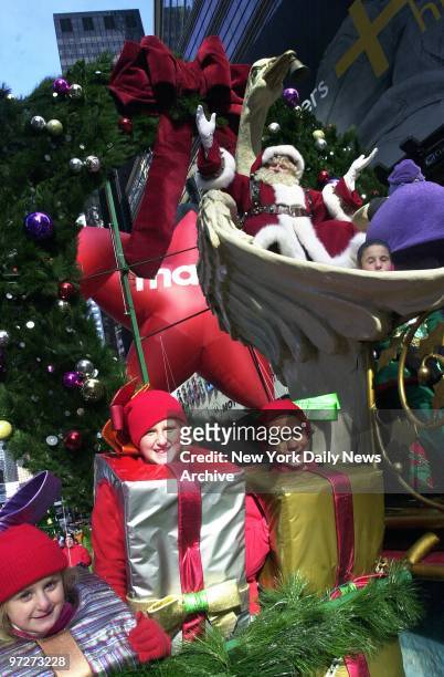 Santa Claus, just in from the North Pole, brings up the rear of the 76th annual Macy's Thanksgiving Day Parade. An estimated 2.5 million people lined...