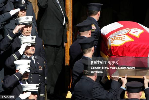 Firefighters salute as coffin of FDNY Lt. Curtis Meyran is carried into Our Lady of Lourdes Church in Malverne, L.I. Meyran and his colleague, John...