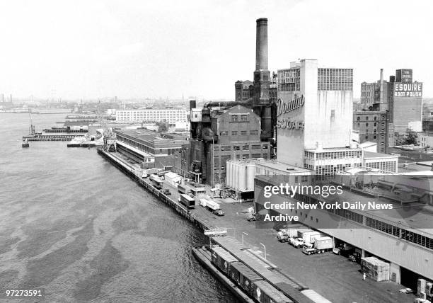 The East River waterfront in Williamsburg, Brooklyn, has for over a centruy been the home of the nation's largest sugar refinery once known as...