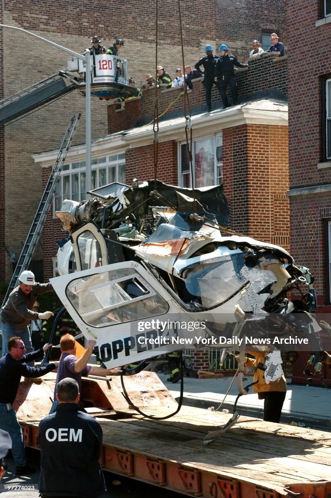 The crumpled body of a Channel 4 news helicopter is carefull