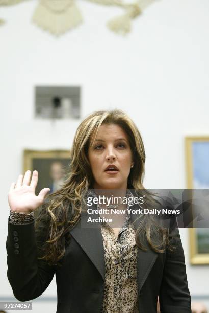 Lisa-Marie Presley swears in before testifying at a House Government Reform Committee hearing on attention deficit disorder.