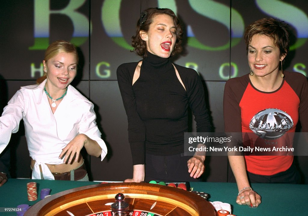 Izabella Miko, Shalom Harlow and Mariska Hargitay watch the