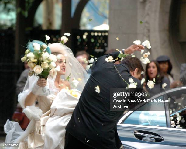 Sarah Jessica Parker confronts Chris Noth and hits him with a wedding bouquet on her wedding day when he stands her up on her wedding day ... During...