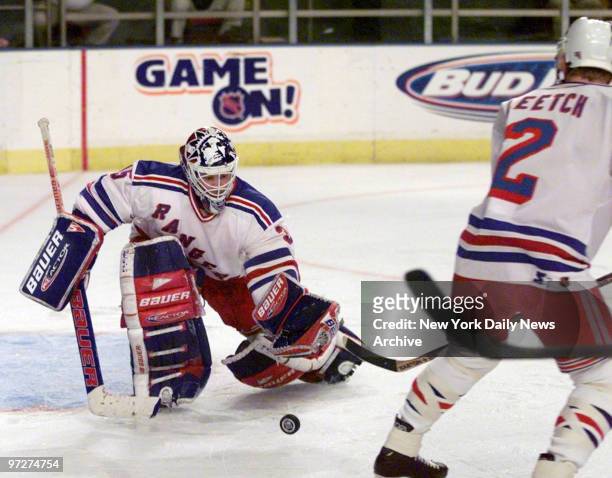 New York Rangers goalie Mike Richter makes a save in game against the Florida Panthers at Madison Square Garden.,