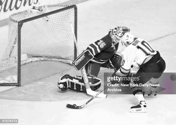 New York Rangers goalie Mike Richter stops Canucks Pavel Bure on a penalty shot in the second during Game 4 of the Stanley Cup Finals against the...