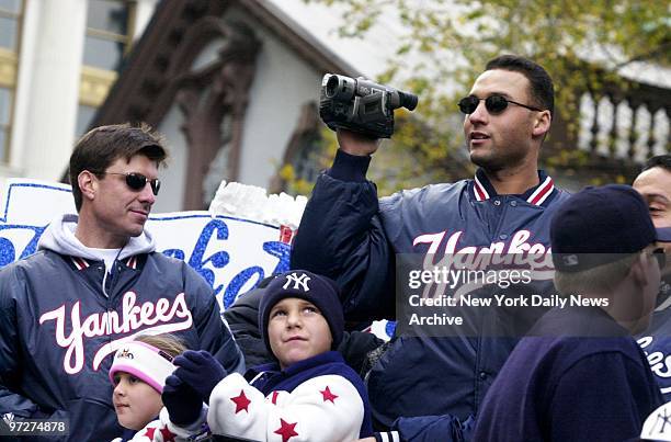 Floats carrying the World Champion New York Yankees move up Broadway through the Canyon of Heroes during a ticker tape parade to celebrate the...