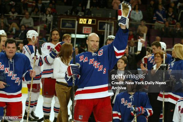 New York Rangers' Mark Messier greets the fans at Madison Square Garden, where Christopher Reeve, his wife, Dana, and son, Will, and an array of...
