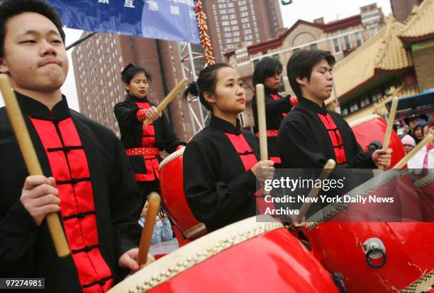The Drum Spirit of China, from Queens, performs during Chinese New Year celebrations at Chatham Square in Chinatown. Today marks the beginning of the...