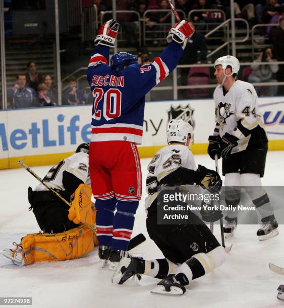 New York Rangers' Steve Rucchin celebrates a goal scored by teammate Petr Sykora against Pittsburgh Penguins' goalie Marc-Andre Fleury at Madison...