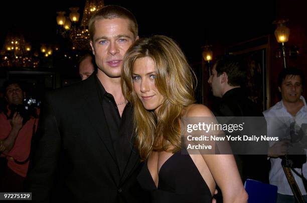 Brad Pitt and wife Jennifer Aniston attend the U.S. Premiere of the movie "Troy" at the Ziegfeld Theater. He stars in the film.