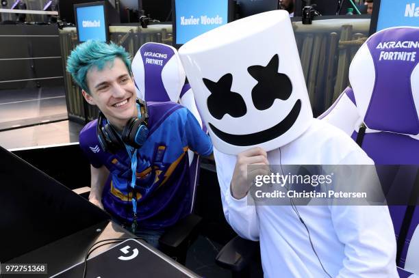 Gamers 'Ninja' and 'Marshmello' pose together during the Epic Games Fortnite E3 Tournament at the Banc of California Stadium on June 12, 2018 in Los...