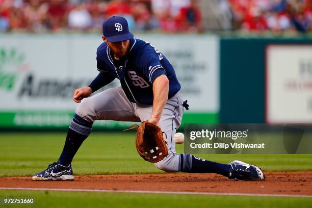 Cory Spangenberg of the San Diego Padres fields a ground ball against the St. Louis Cardinals in the second inning at Busch Stadium on June 12, 2018...