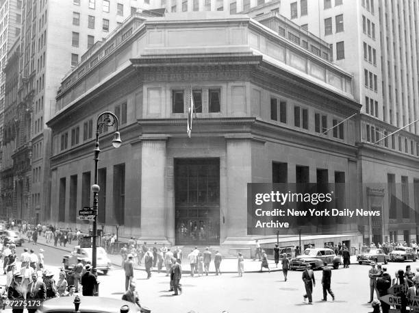 Morgan & Co. Juts out like a fortress on corner of Broad and Wall Sts. Once an investment-banking house, Morgan's is now an incorporated bank.