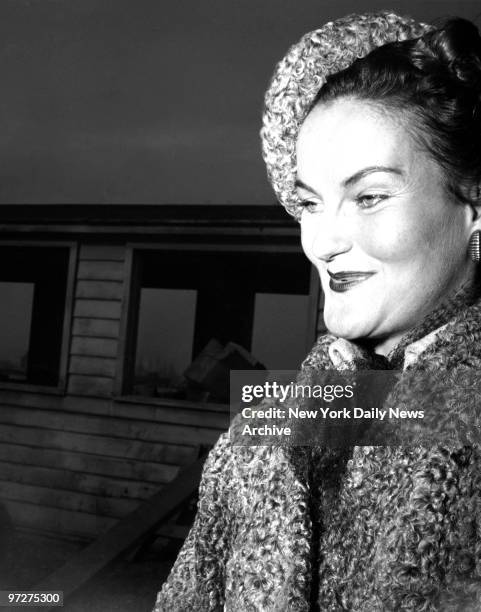 Mrs. Porfirio Rubirosa, Doris Duke as she arrived at LaGuardia Field yesterday.,