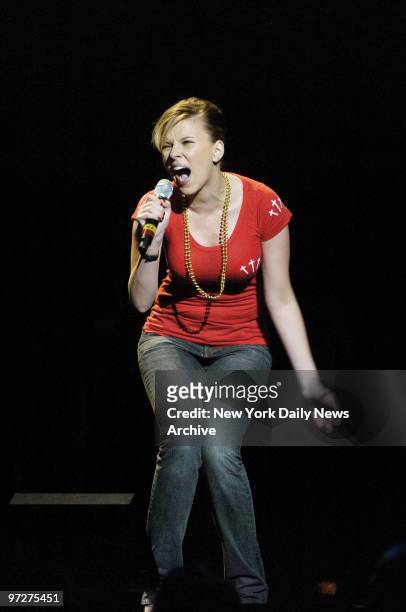 Scarlett Johansson performs during the "From the Big Apple to the Big Easy" benefit concert at Madison Square Garden. Proceeds from the concert will...